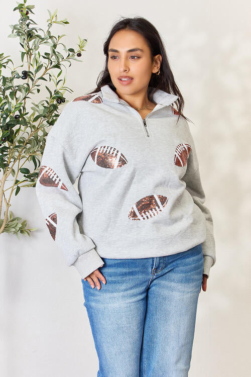 Double Take Full Size Sequin Football Half Zip Long Sleeve Sweatshirt