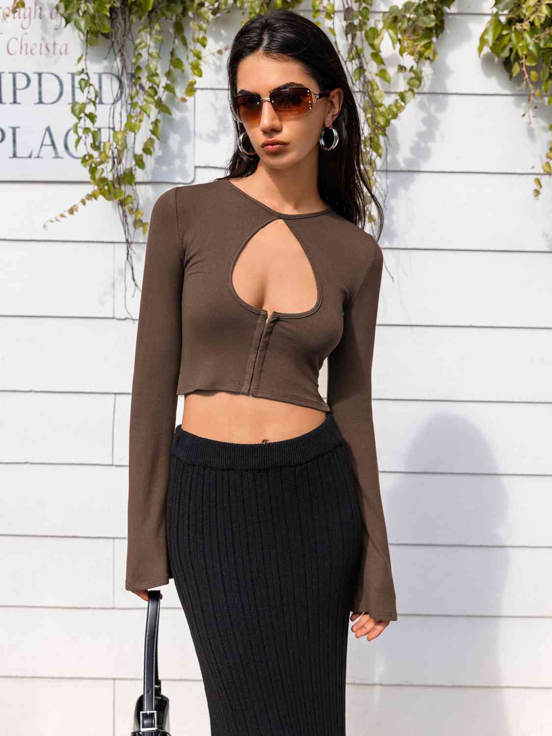 Lone Sleeve Cutout Zip Up Crop Top